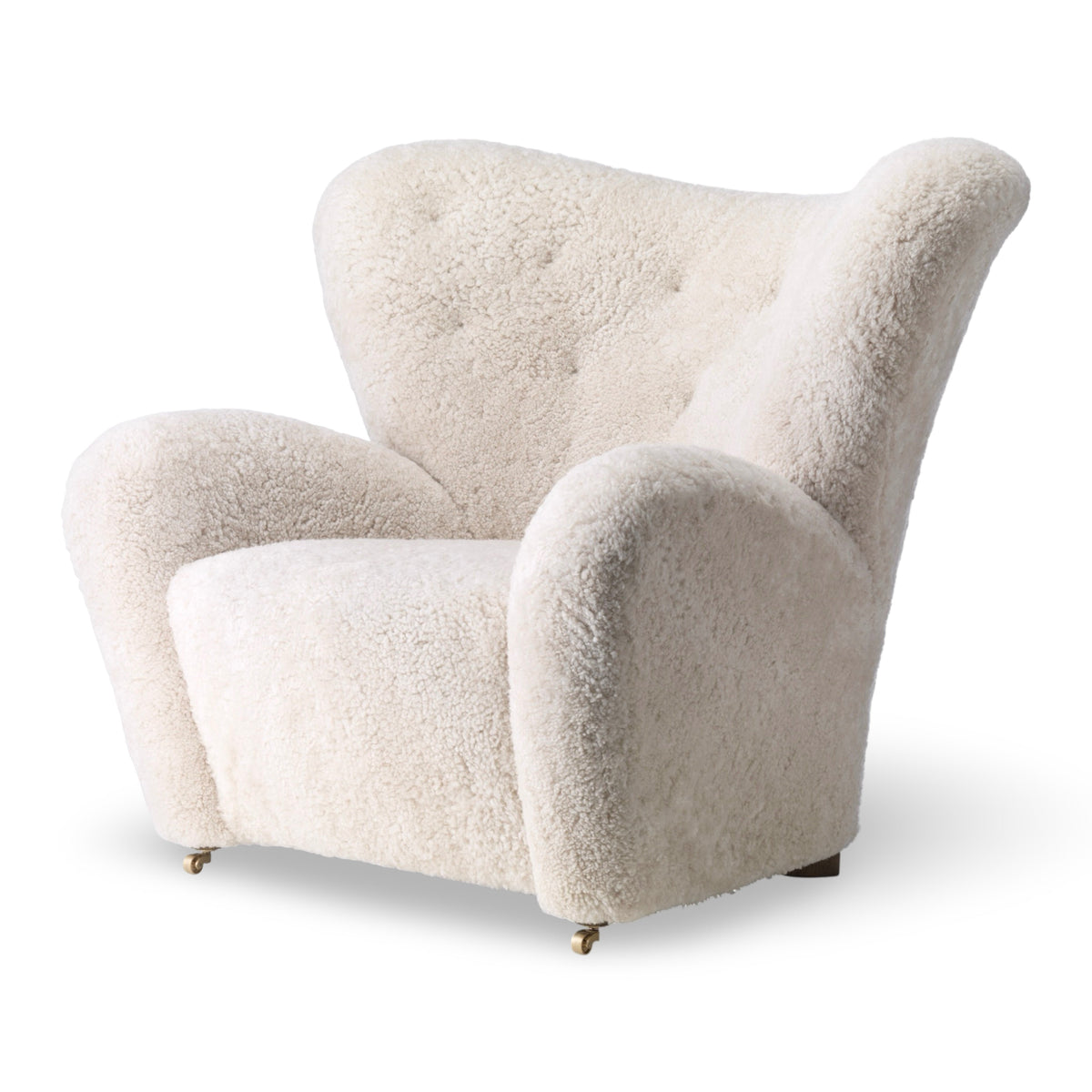 Audo Copenhagen Tired Man lounge chair in sheepskin